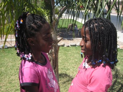 braids with beads hairstyle African American little girls