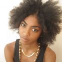 Jessi M'Bengue black natural hair model blow out hair