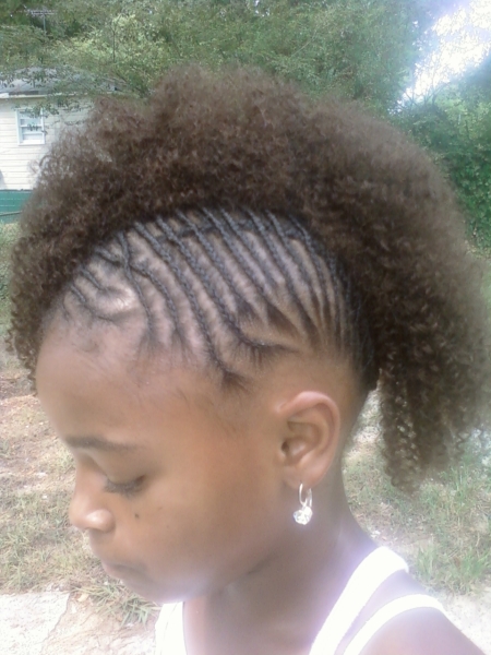 I love braided mohawk hairstyles especially when the stylist has placed some 