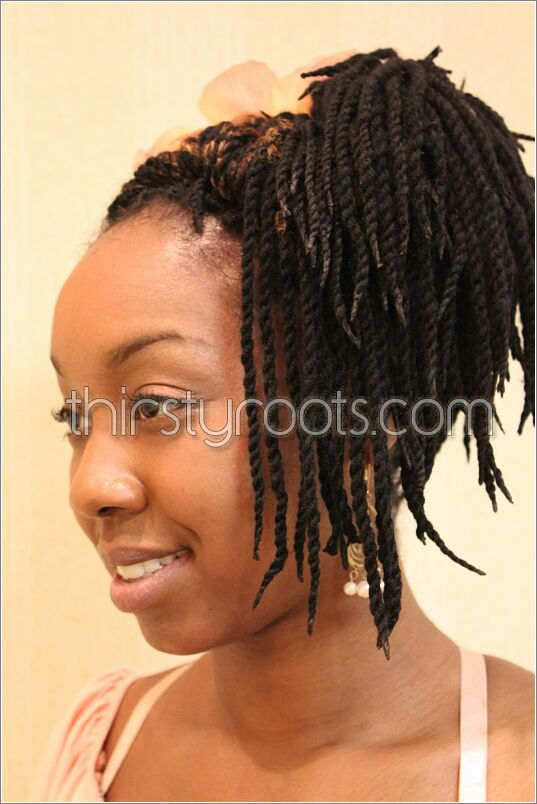 Natural hair with flowers - twist braids updo left view 