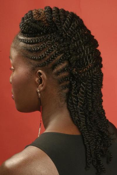 Braids and twists hairstyle with a rolled bun 