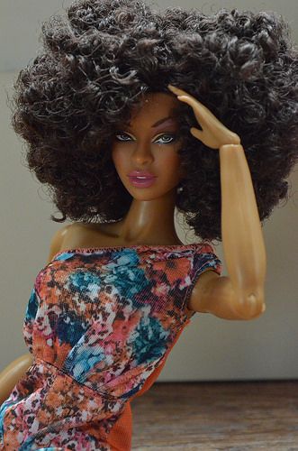 black barbie head with natural hair