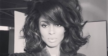 Short Red Haircut for Black Women: Monica Brown